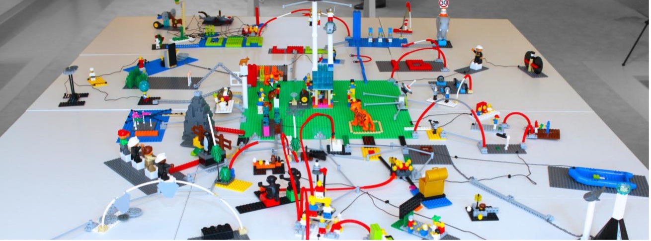 Lady smiling in class at male student